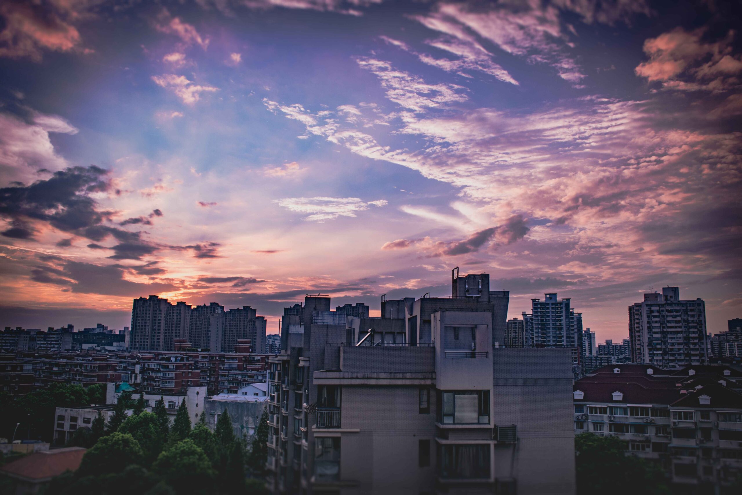 Captivating cityscape at dusk featuring a vivid sky and modern urban skyline.